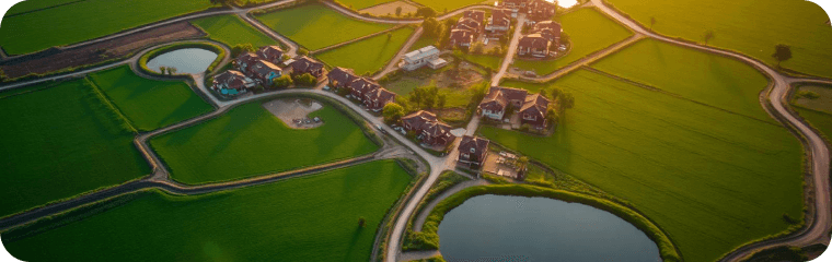 Aerial view of a delta village at golden hour